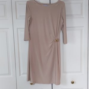 Large tan dress with gold buckle detailing